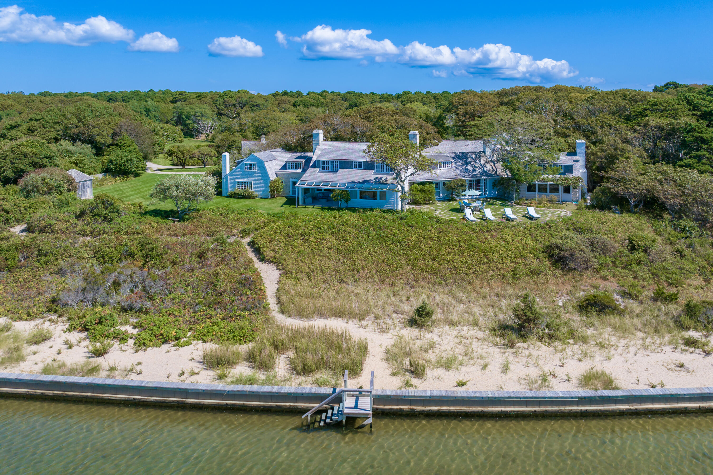 17 Indian Trail Osterville, MA 02655 - Photo 3 of 19 a view of a lake with houses