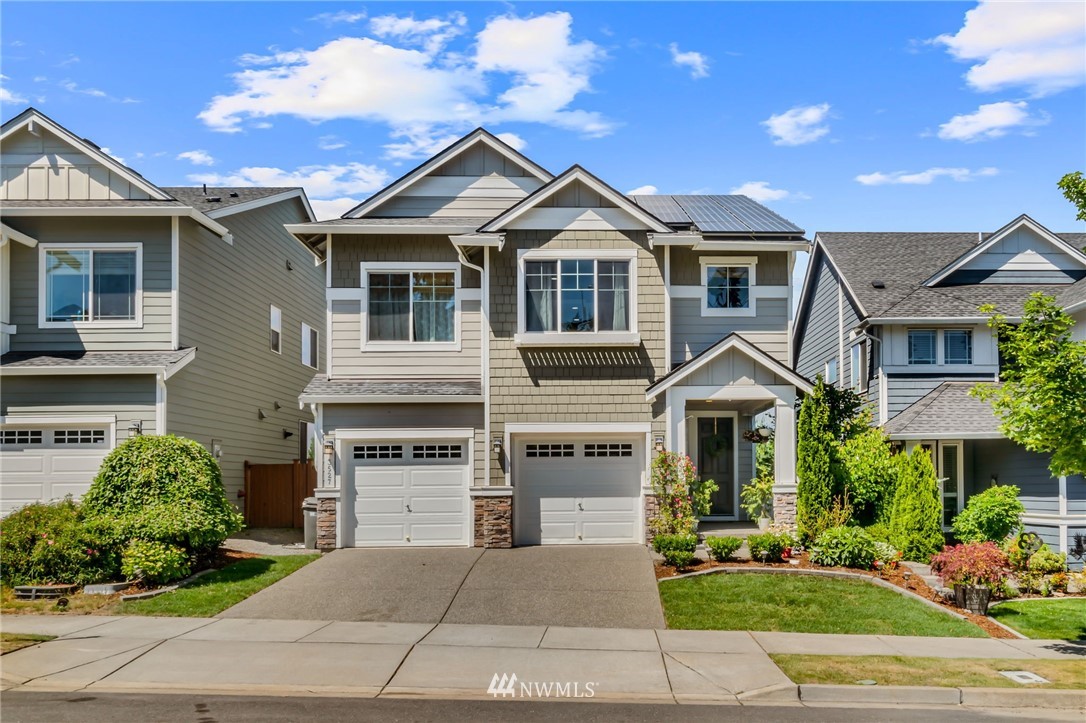 3527 198th Street Southeast Bothell, WA 98012 - Photo 2 of 40 a front view of a house with a yard