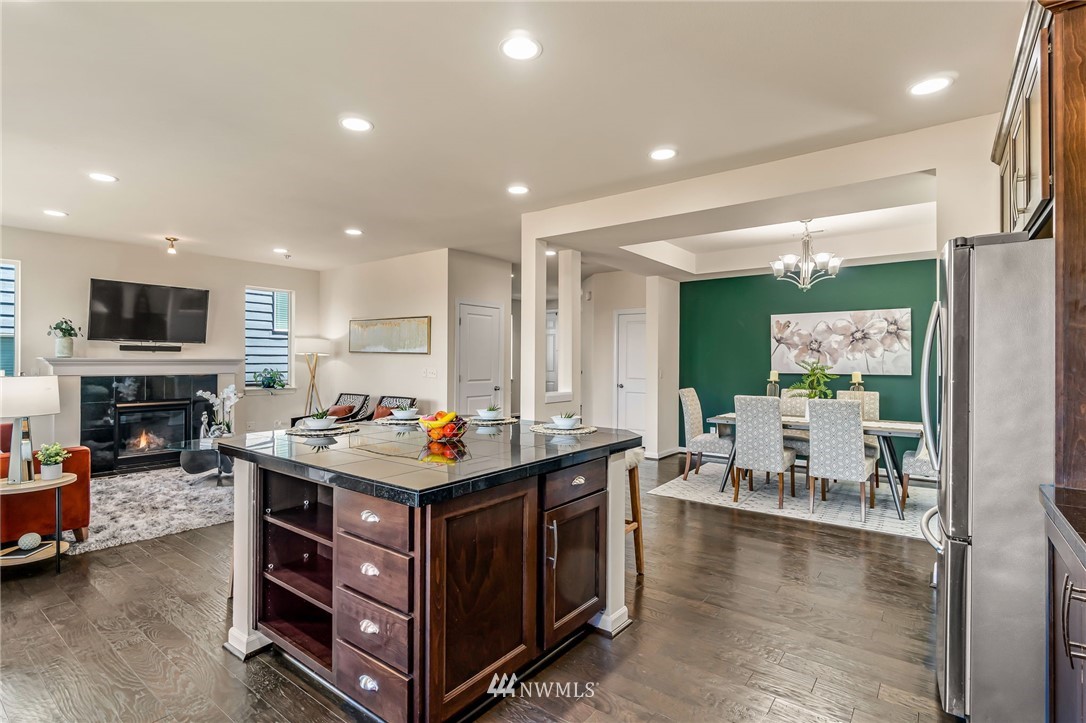 3527 198th Street Southeast Bothell, WA 98012 - Photo 14 of 40 a room with furniture and a fireplace