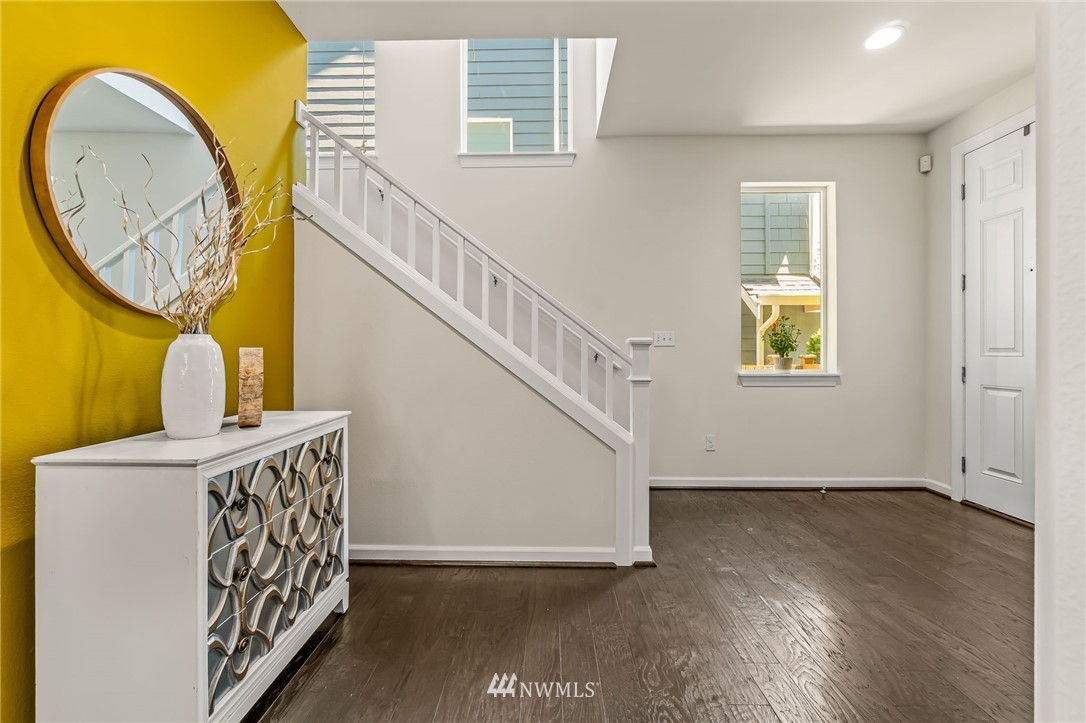 3527 198th Street Southeast Bothell, WA 98012 - Photo 21 of 40 a view of an entryway with wooden floor