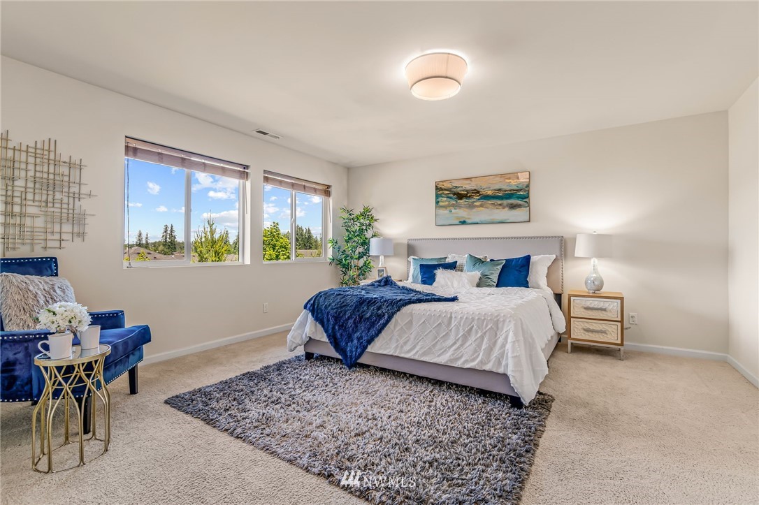 3527 198th Street Southeast Bothell, WA 98012 - Photo 23 of 40 a bedroom with a bed and a window