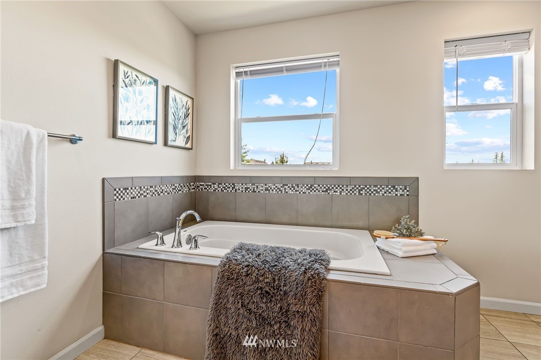 3527 198th Street Southeast Bothell, WA 98012 - Photo 27 of 40 a bathroom with a sink and a mirror