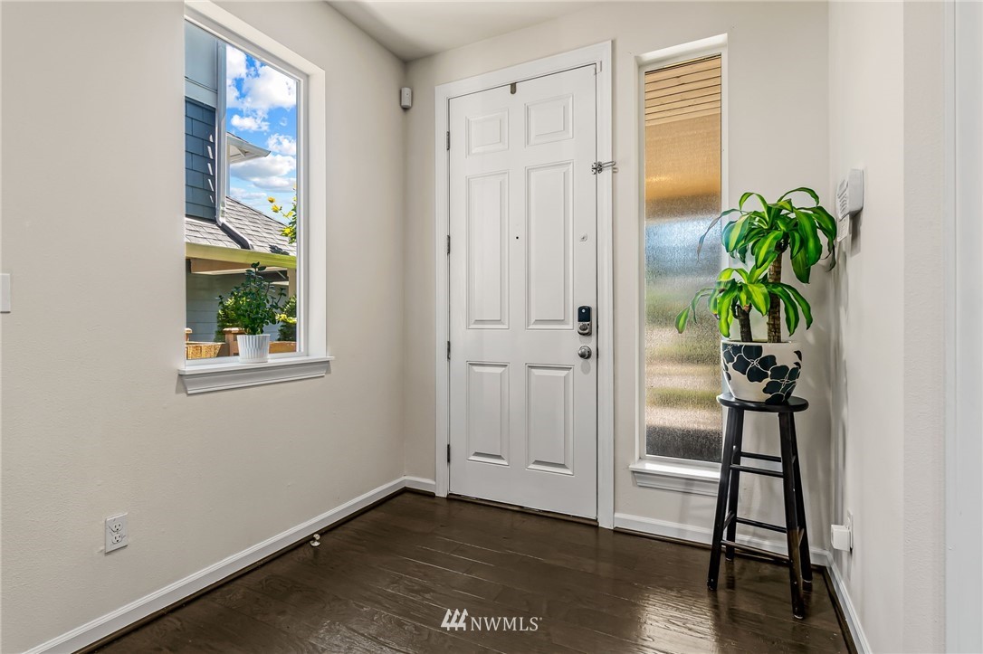 3527 198th Street Southeast Bothell, WA 98012 - Photo 4 of 40 a view of an entryway with wooden floor