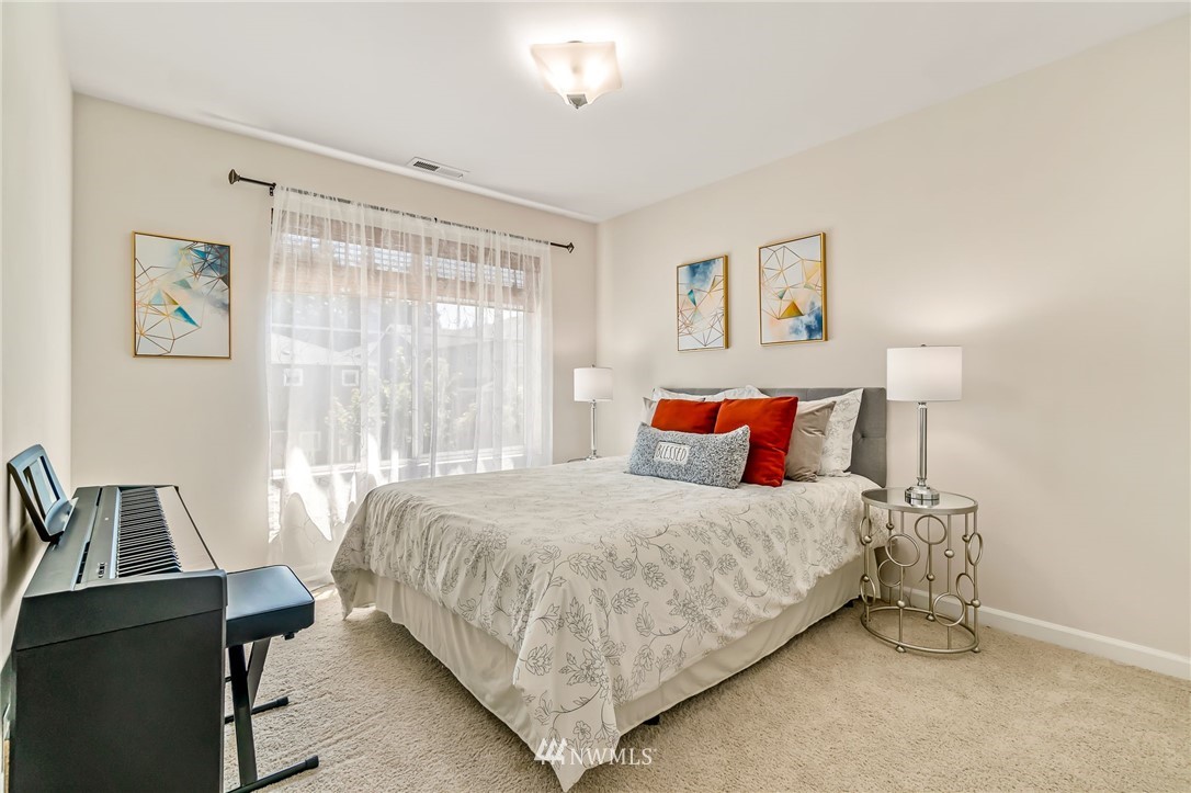 3527 198th Street Southeast Bothell, WA 98012 - Photo 32 of 40 a bedroom with a bed and a desk