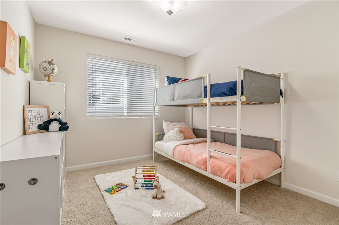 3527 198th Street Southeast Bothell, WA 98012 - Photo 35 of 40 a bedroom with a bed and a window