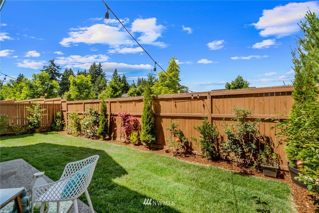 3527 198th Street Southeast Bothell, WA 98012 - Photo 39 of 40 a view of a chairs and table in a yard
