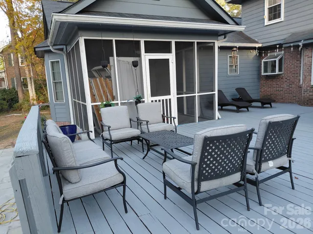 a view of a tree in the middle of a yard