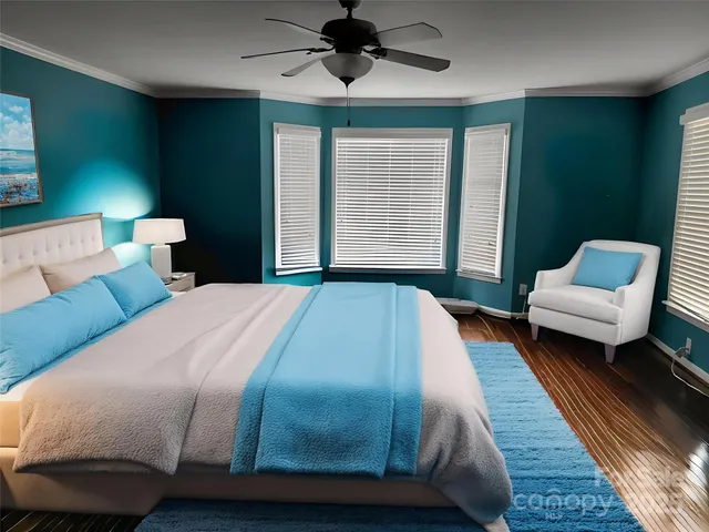 a bedroom with a bed and a couch