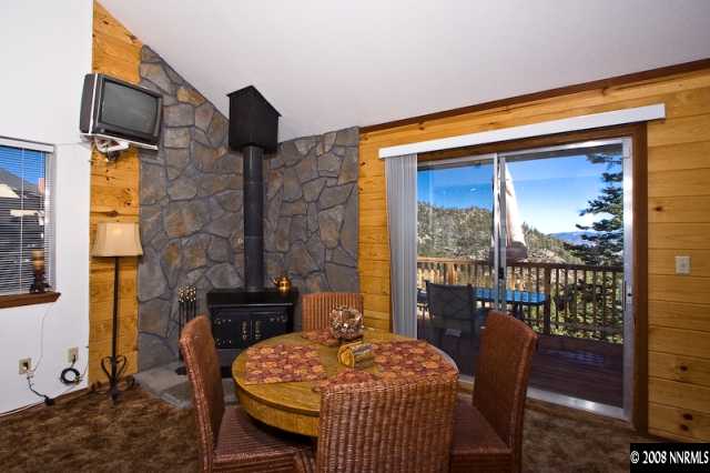 158 A Tramway Drive Stateline, NV 89449 - Photo 4 of 9 a dining room with furniture and wooden floor