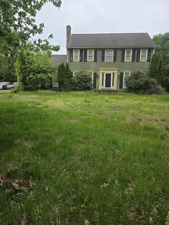 4 Canoe River Road Easton, MA 02375 - Photo 7 of 9 a front view of a house with a yard