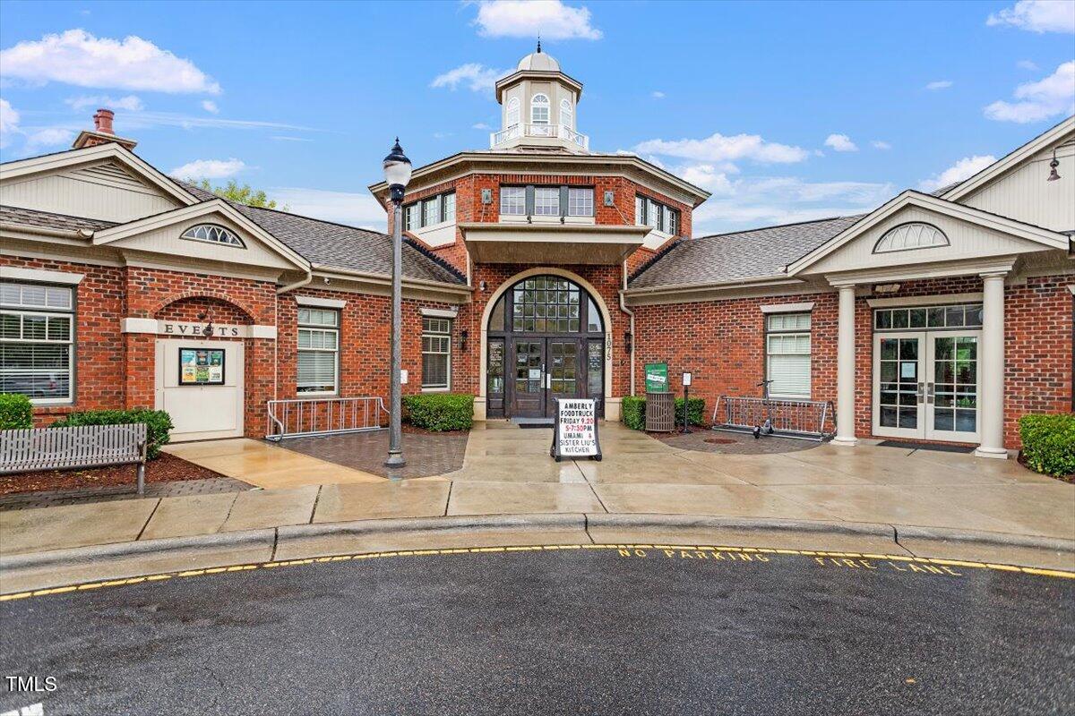 304 White Iris Loop Cary, NC 27519 - Photo 67 of 76 a view of a brick house with a large windows