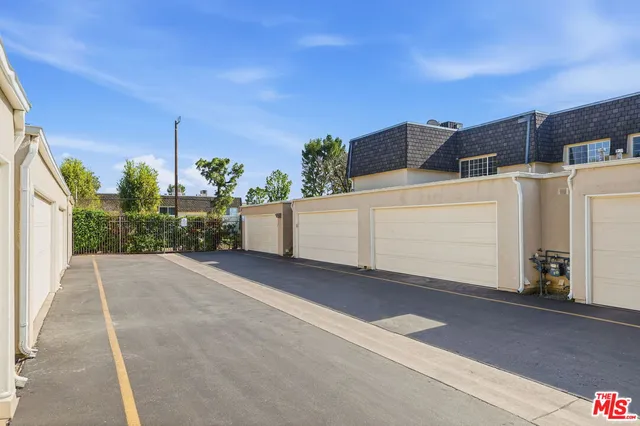 a view of a backyard with a garden