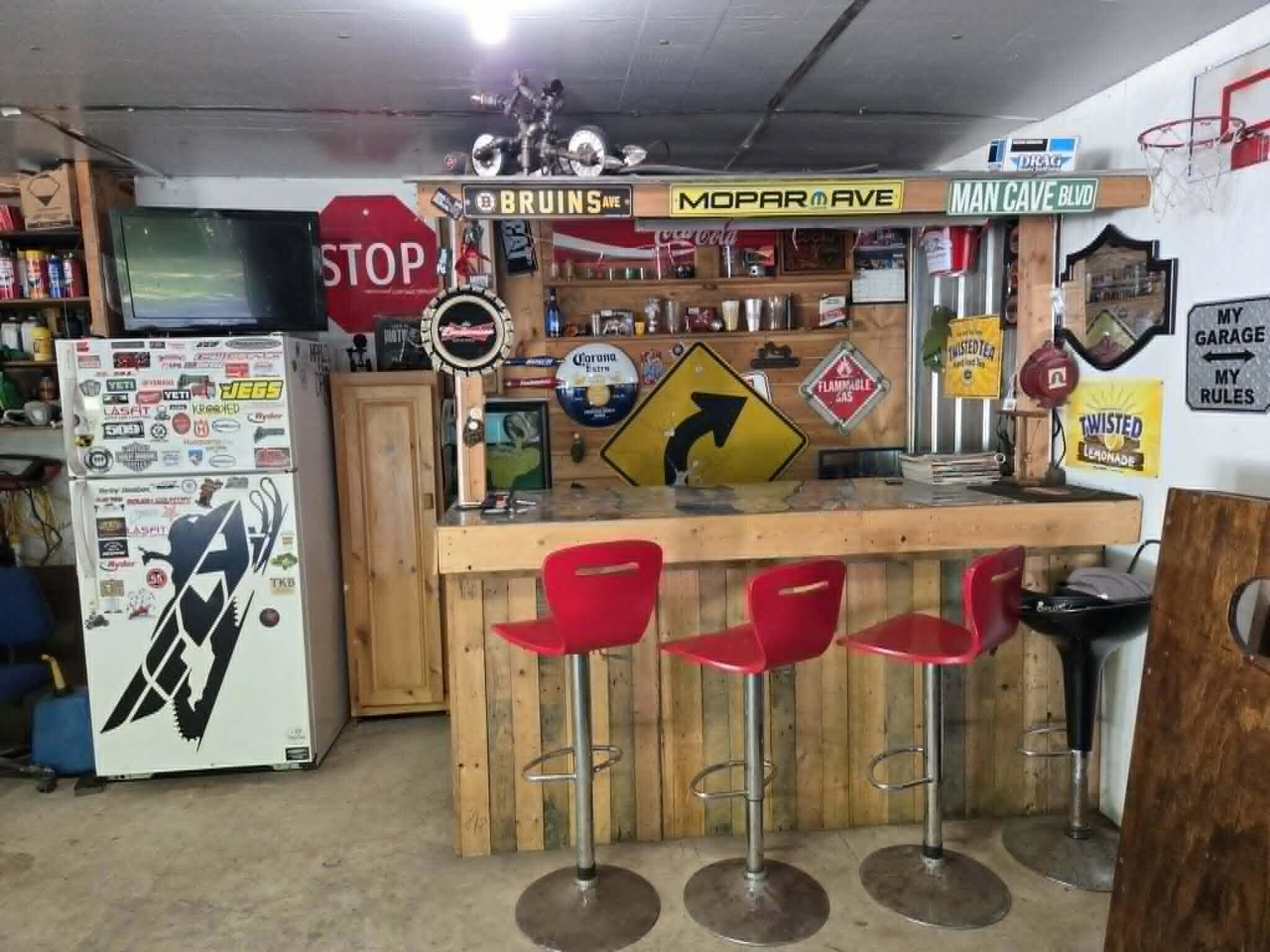 605 Tate Road Corinth, ME 04427 - Photo 34 of 47 bar in garage