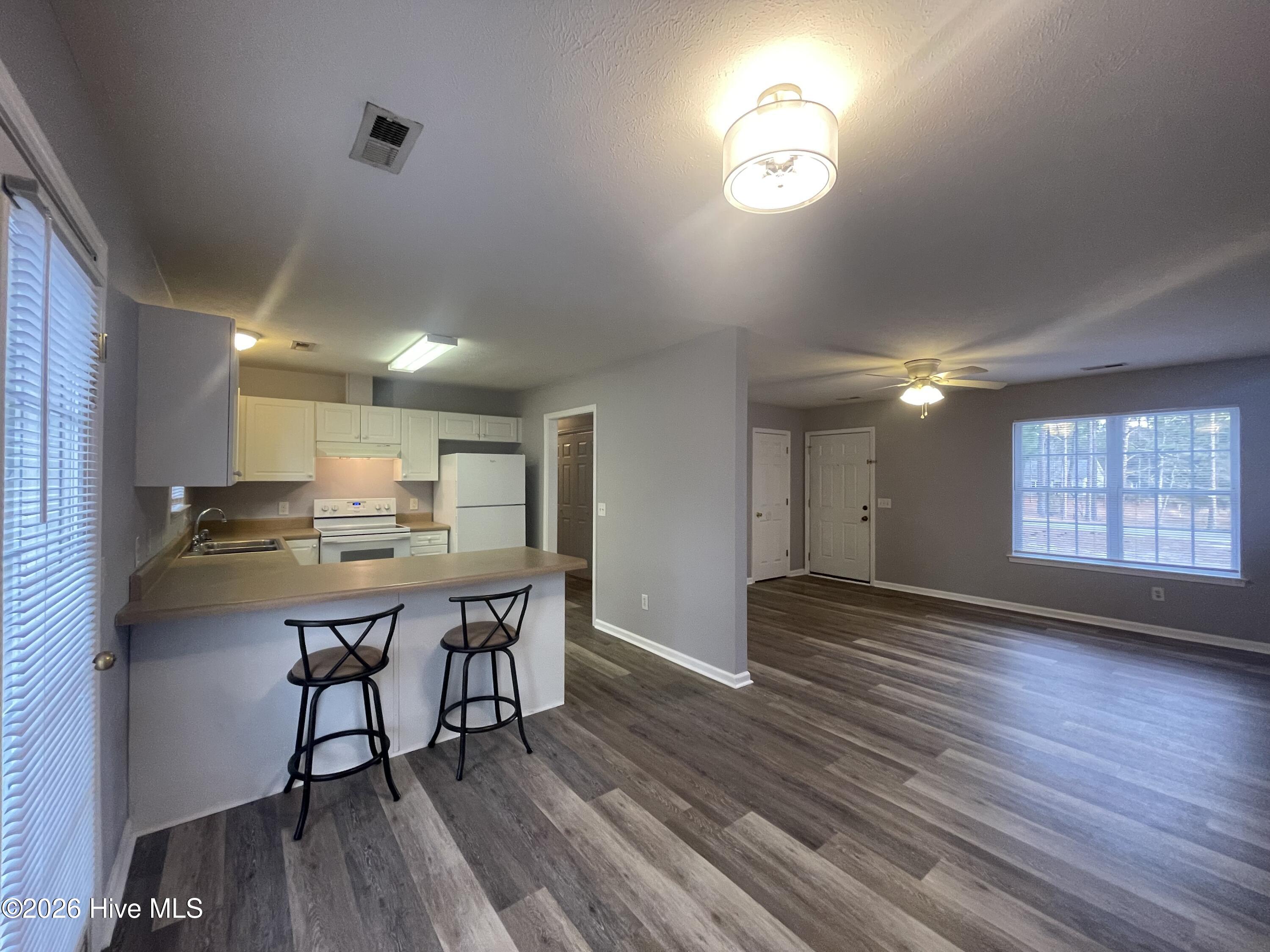 1469 East Boiling Spring Road Southport, NC 28461 - Photo 4 of 34 Photo Jan 08 2026, 4 15 52 PM