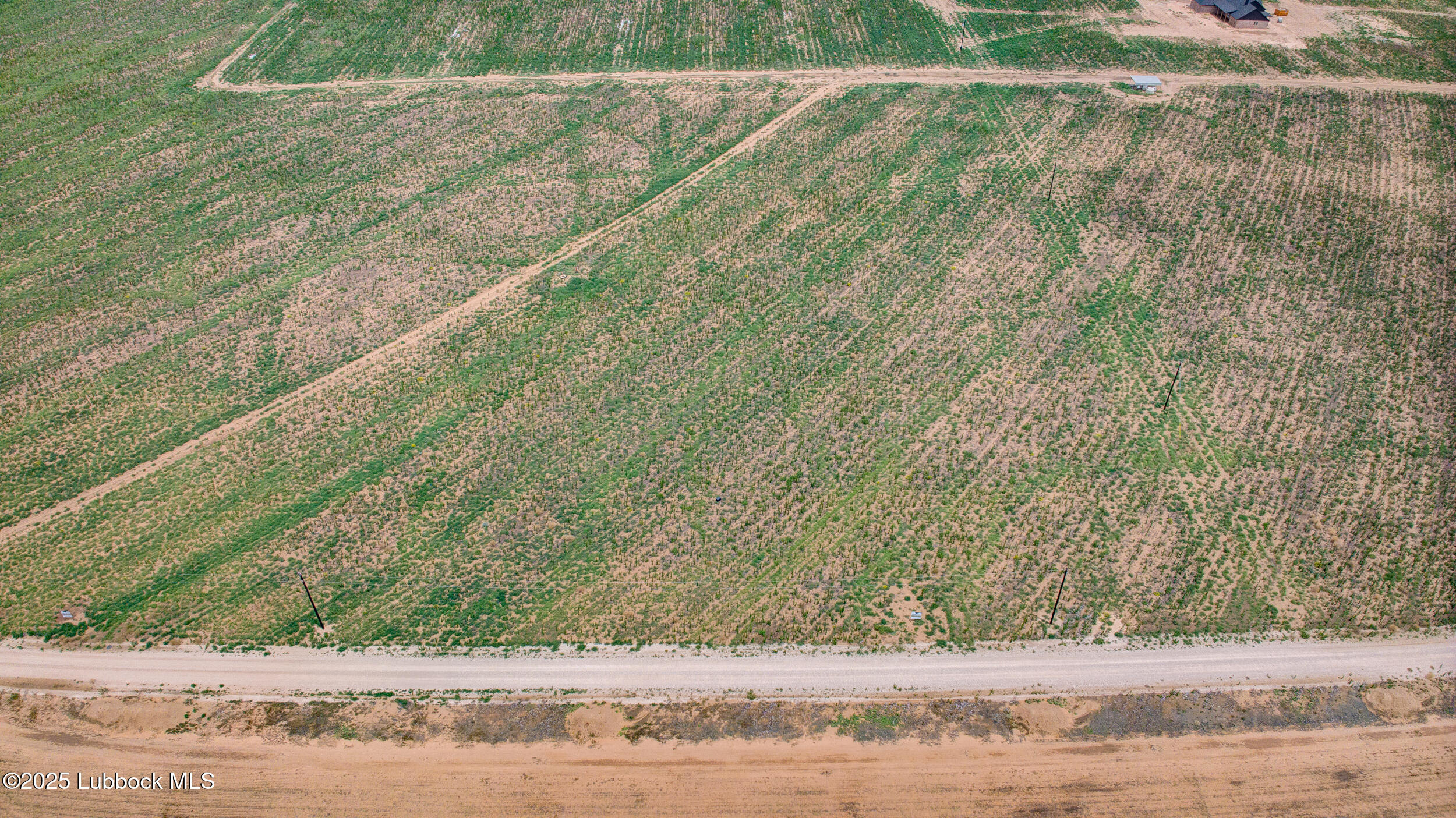 27 Woodrow Slaton, TX 79364 - Photo 1 of 12 DJI_20250611150751_0001_D_2_D_3_D_4_D_5_