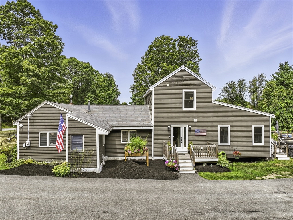 133 Rowley Hill Road Sterling, MA 01564 - Photo 1 of 41 a view of a house with a yard and sitting area