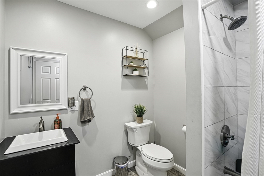 133 Rowley Hill Road Sterling, MA 01564 - Photo 34 of 41 a bathroom with a sink toilet and shower
