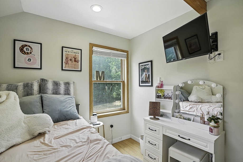 133 Rowley Hill Road Sterling, MA 01564 - Photo 36 of 41 a bedroom with furniture and a window