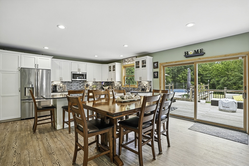 133 Rowley Hill Road Sterling, MA 01564 - Photo 8 of 41 a view of a dining room with furniture window and outside view