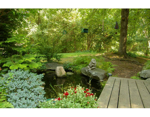 40 Middleby Road Lexington, MA 02421 - Photo 3 of 6 a view of a garden with flowers