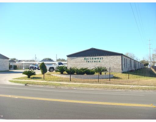 a view of a swimming pool with a house