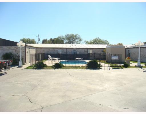 11633 Leopard Street, Unit 9 Corpus Christi, TX 78410 - Photo 2 of 6 a view of a terrace with a barbeque