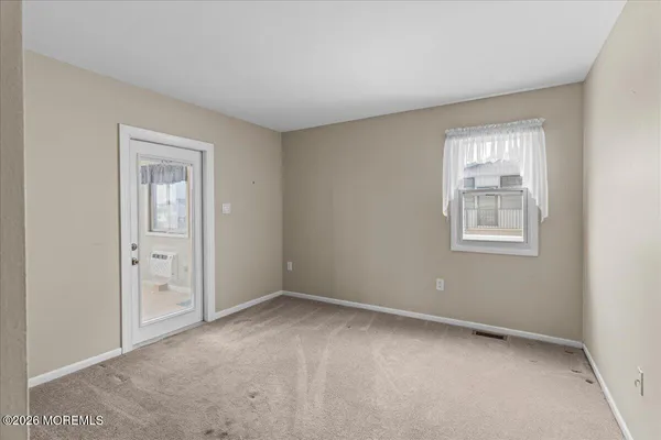 a bathroom with a shower and a shower
