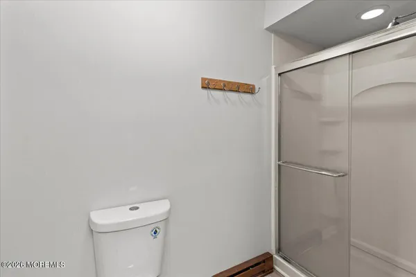 a bathroom with a sink vanity and mirror