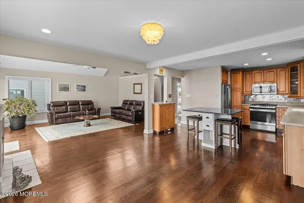 a kitchen with a table and chairs in it