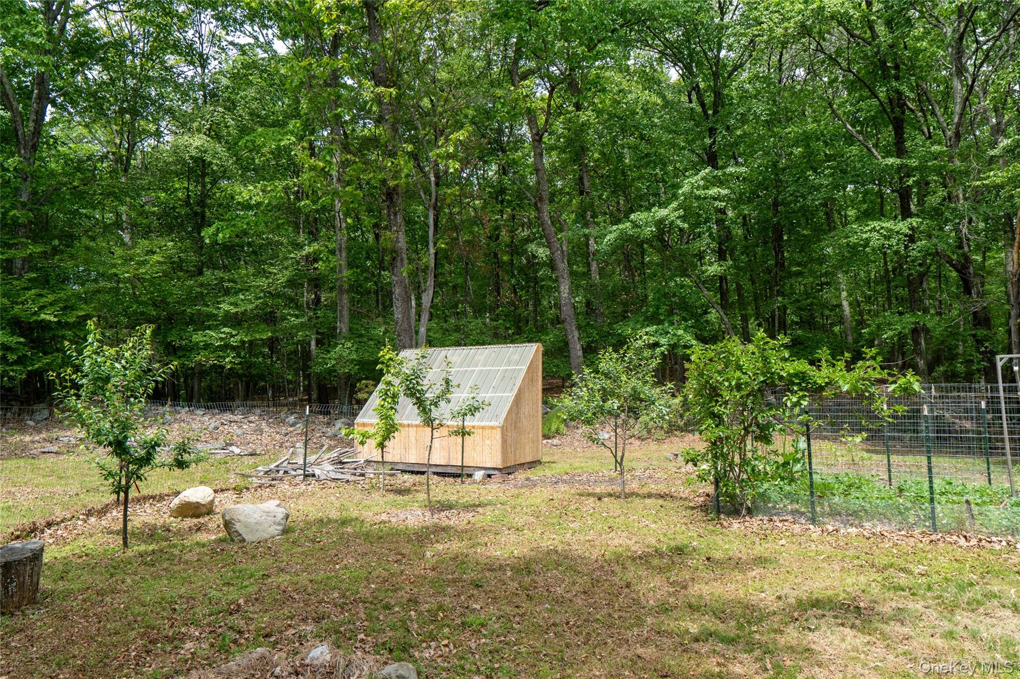 182 Frey Road Pine Bush, NY 12566 - Photo 28 of 33 a view of a backyard with wooden fence