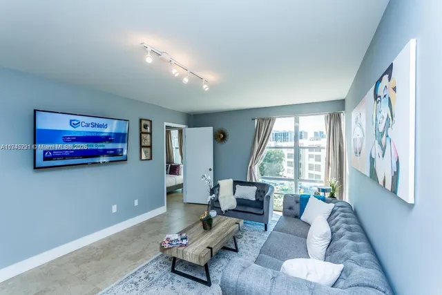 a view of a swimming pool with a garden and plants