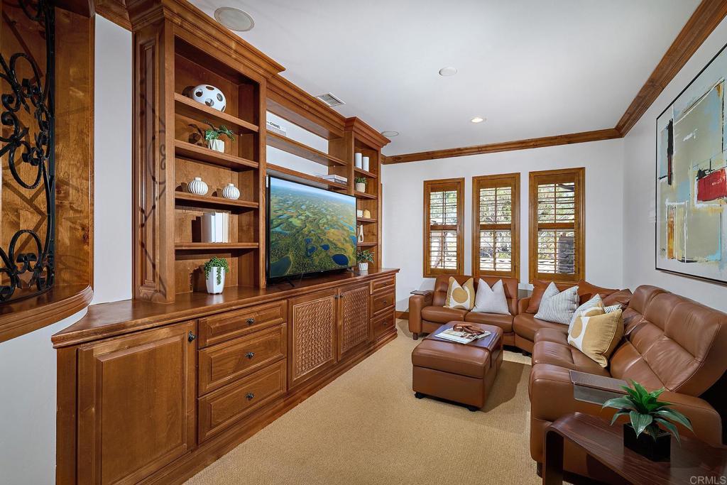 6921 Corte Langosta Carlsbad, CA 92009 - Photo 17 of 20 a living room with furniture