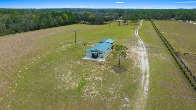 a view of livingroom with furniture and wooden floor