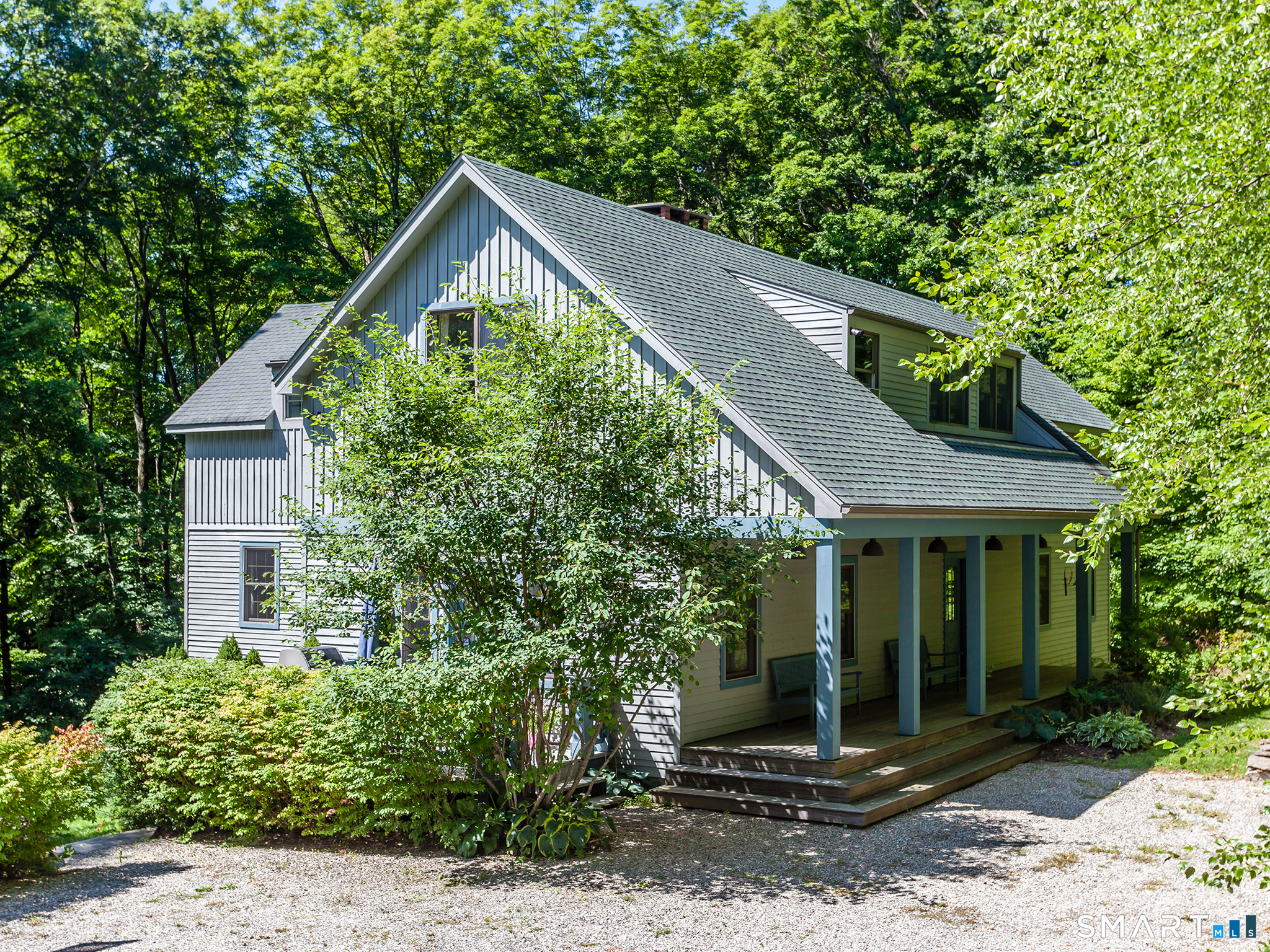 68 Hopkins Road Warren, CT 06777 - Photo 1 of 30 a front view of a house with garden
