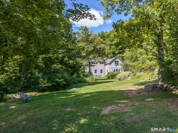 a view of a house with a big yard