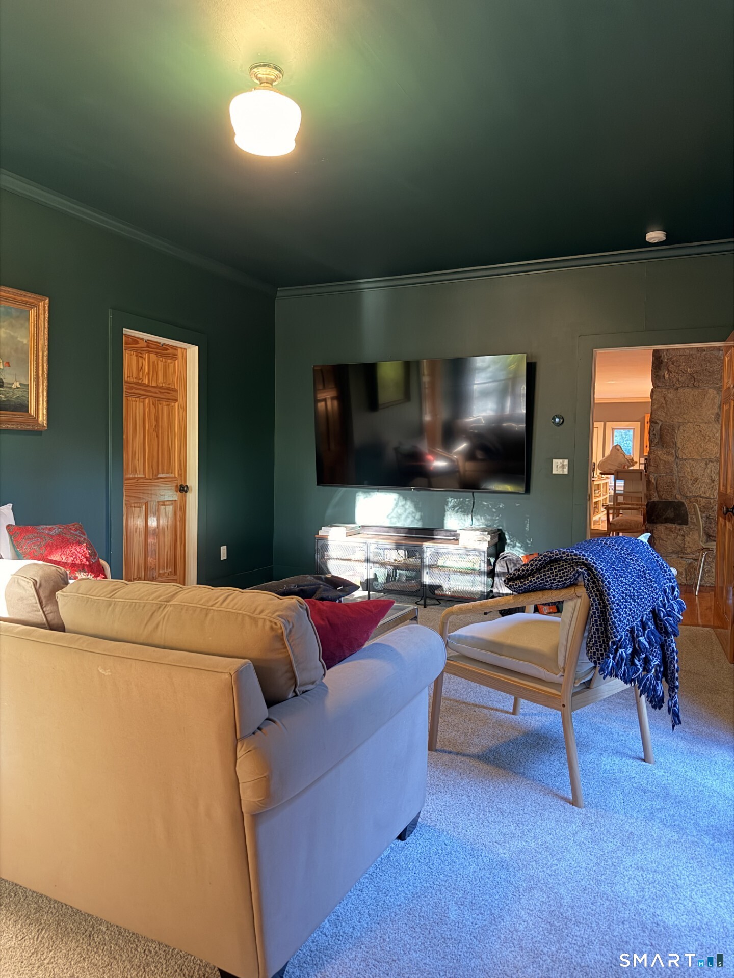 68 Hopkins Road Warren, CT 06777 - Photo 10 of 30 a living room with furniture and a flat screen tv