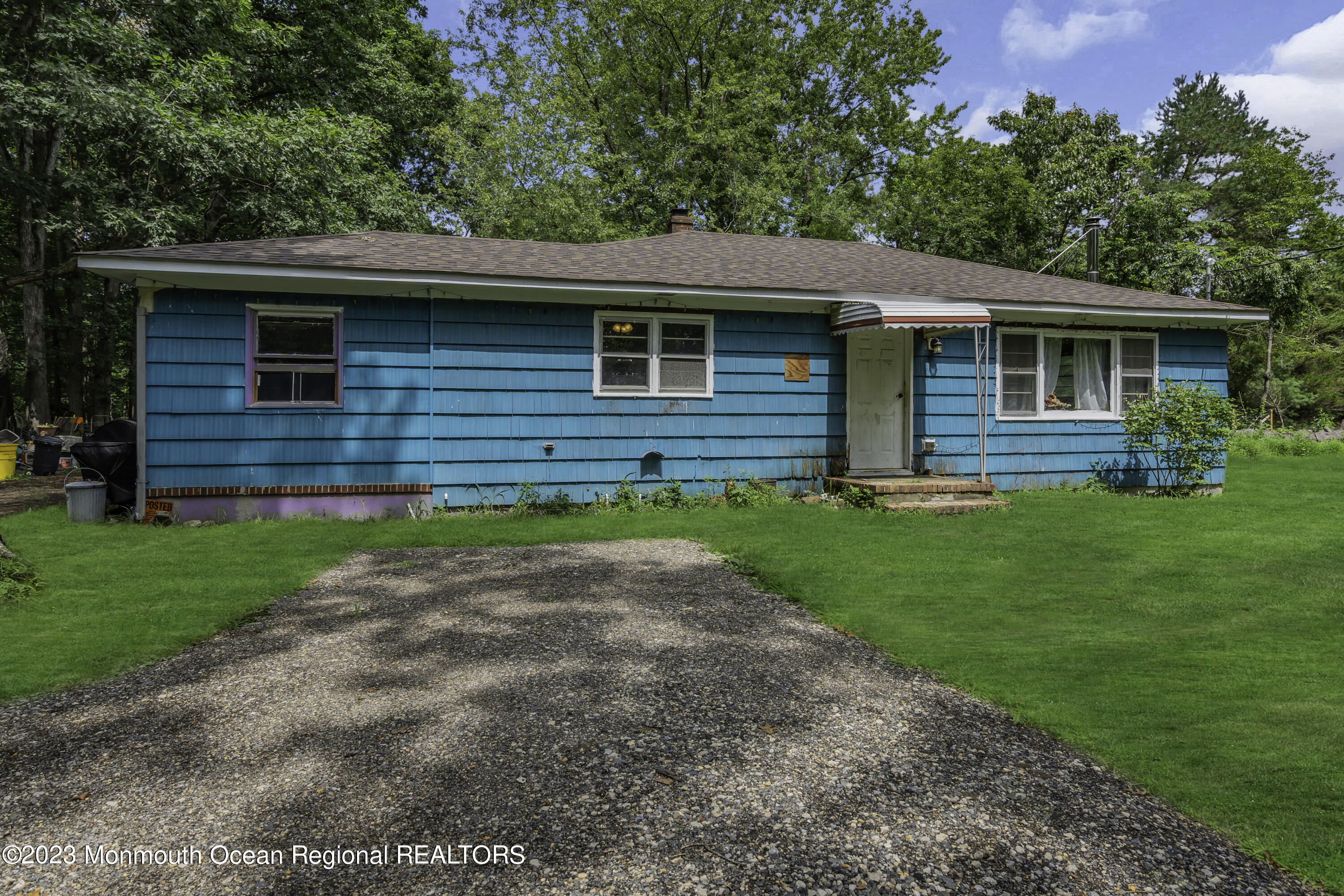 856 Bowman Road Jackson, NJ 08527 - Photo 1 of 21 a front view of a house with a yard