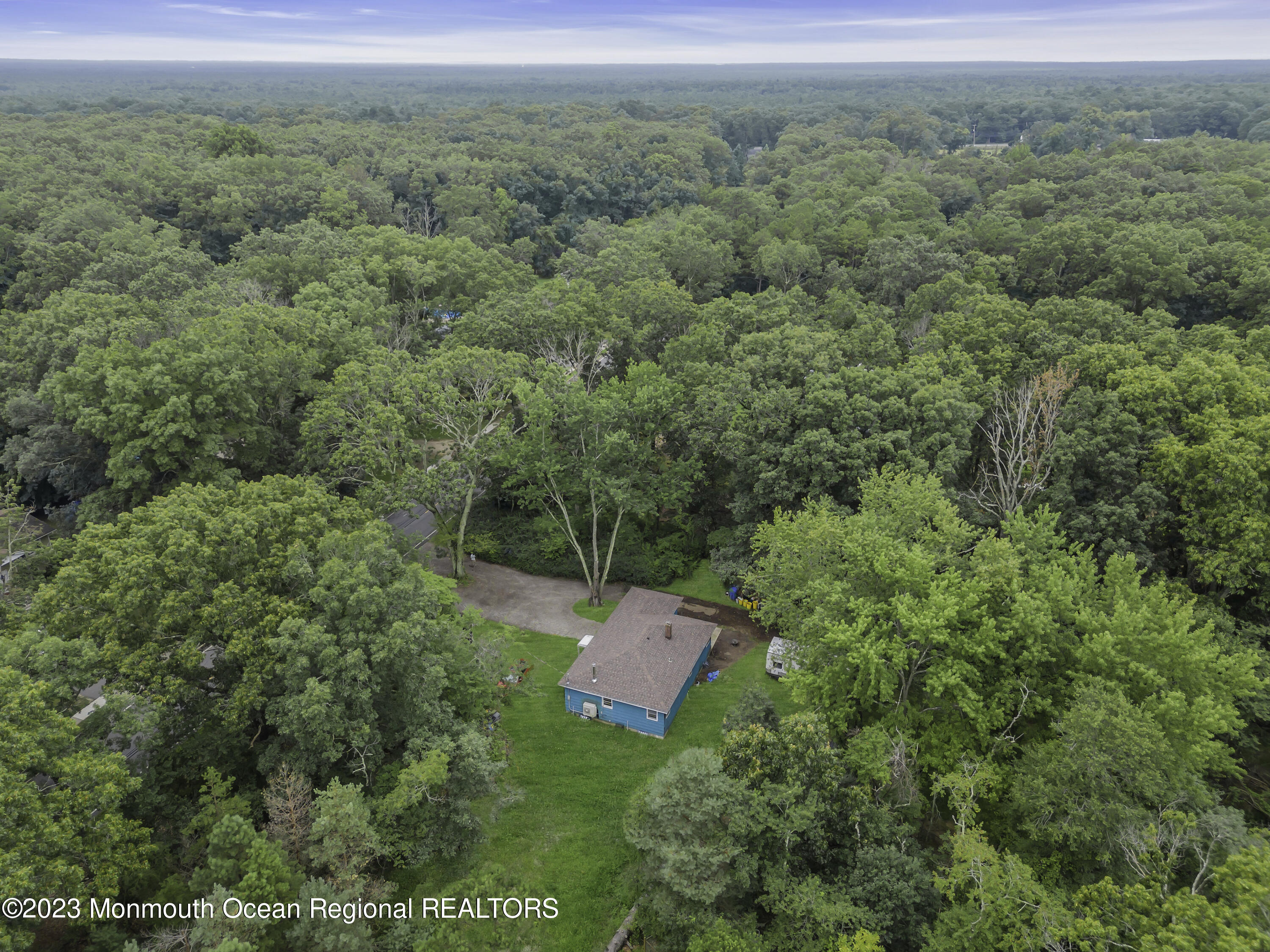 856 Bowman Road Jackson, NJ 08527 - Photo 20 of 21 an aerial view of a house with a yard