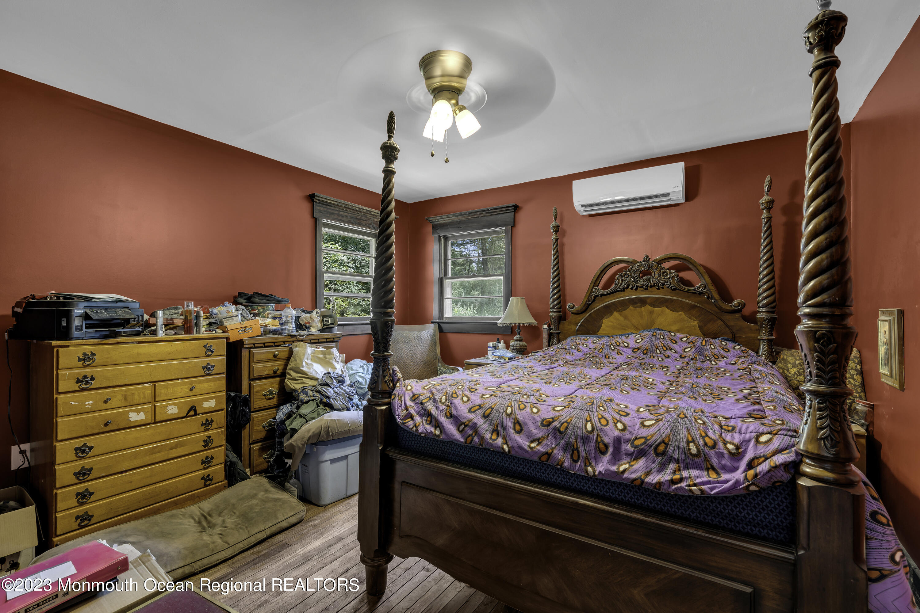 856 Bowman Road Jackson, NJ 08527 - Photo 10 of 21 a bed room with a bed and a chandelier