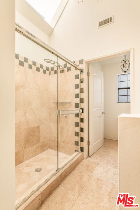 36 Navy Street, Unit 1 Venice, CA 90291 - Photo 32 of 49 a bathroom with a shower and a bath tub