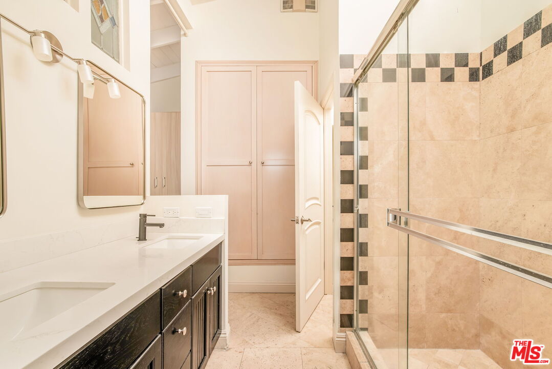 36 Navy Street, Unit 1 Venice, CA 90291 - Photo 35 of 49 a bathroom with a shower and a sink