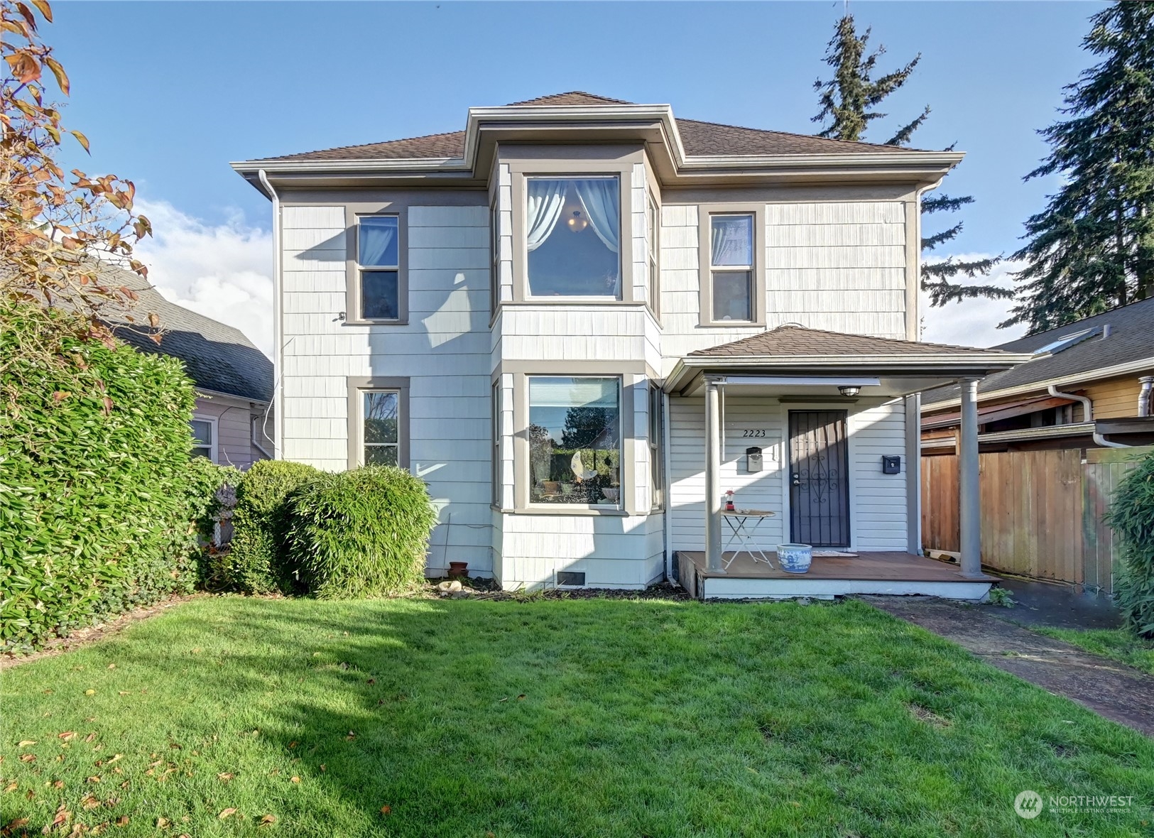 2223 Rockefeller Avenue Everett, WA 98201 - Photo 1 of 21 a front view of a house with a yard