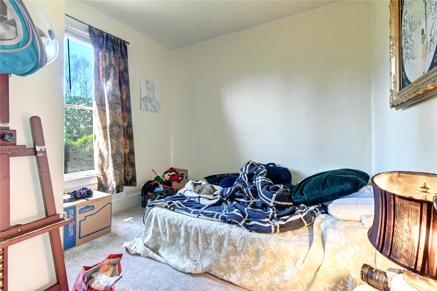 2223 Rockefeller Avenue Everett, WA 98201 - Photo 18 of 21 a bed room with a bed and a chair