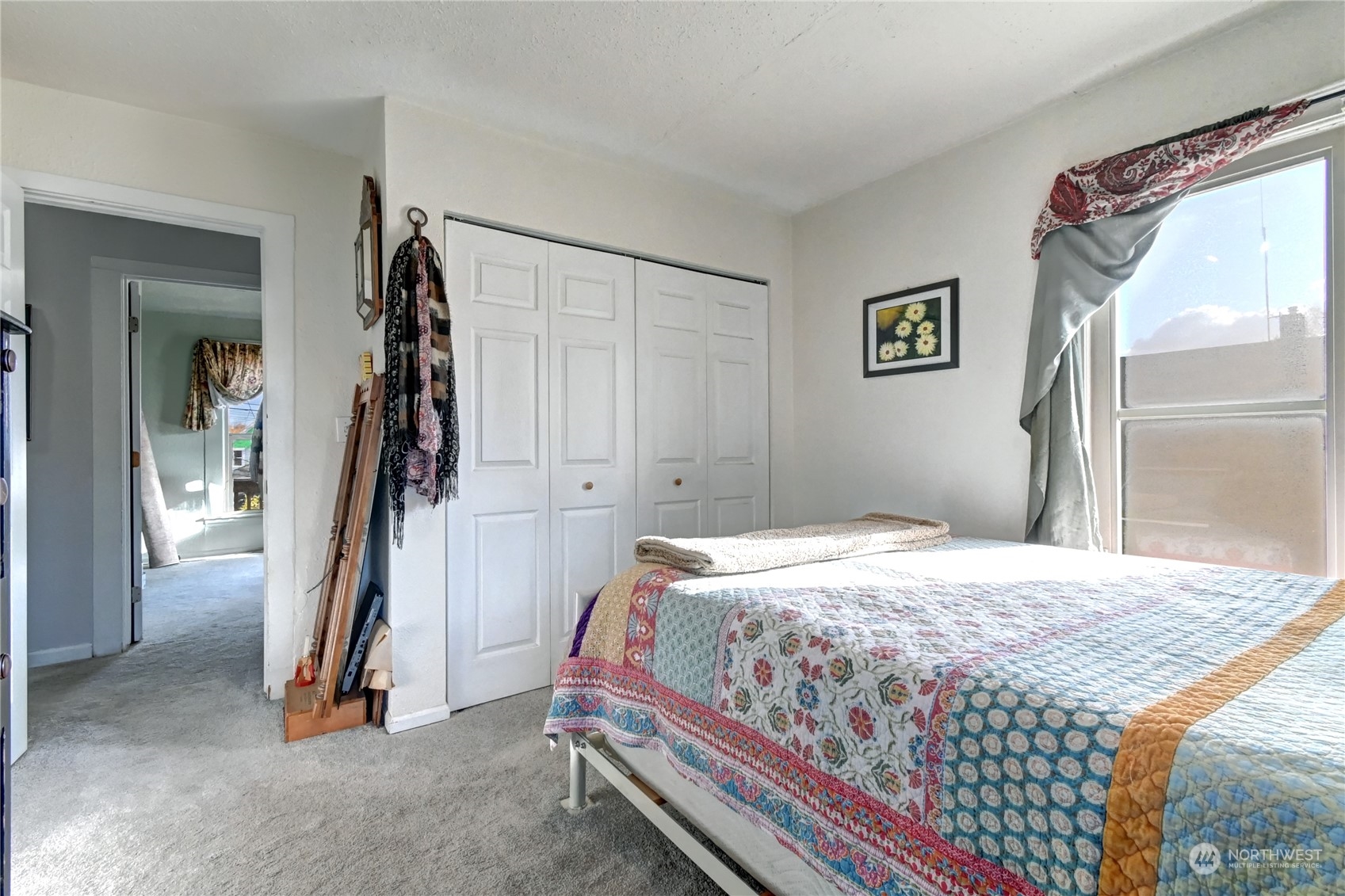 2223 Rockefeller Avenue Everett, WA 98201 - Photo 7 of 21 a bedroom with a bed and a window