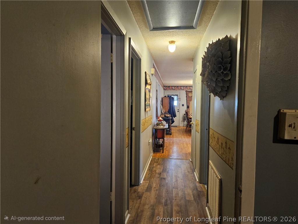 4547 Legion Road Hope Mills, NC 28348 - Photo 26 of 28 a hallway with hardwood floor