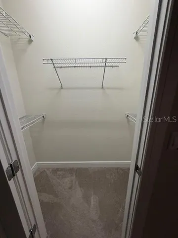 a view of small space with racks on the wall