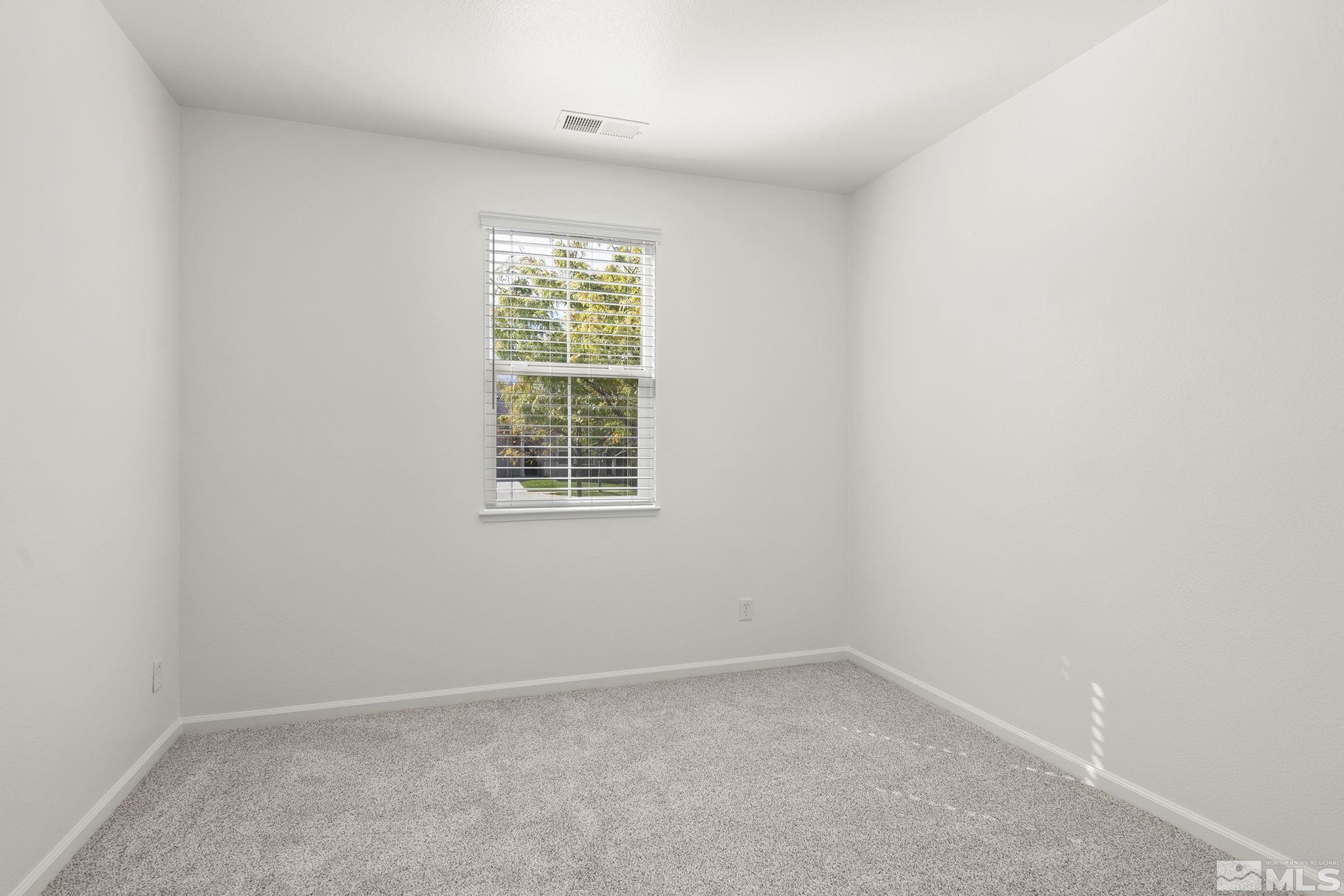 9130 Andraste Way Reno, NV 89506 - Photo 15 of 19 an empty room with a window