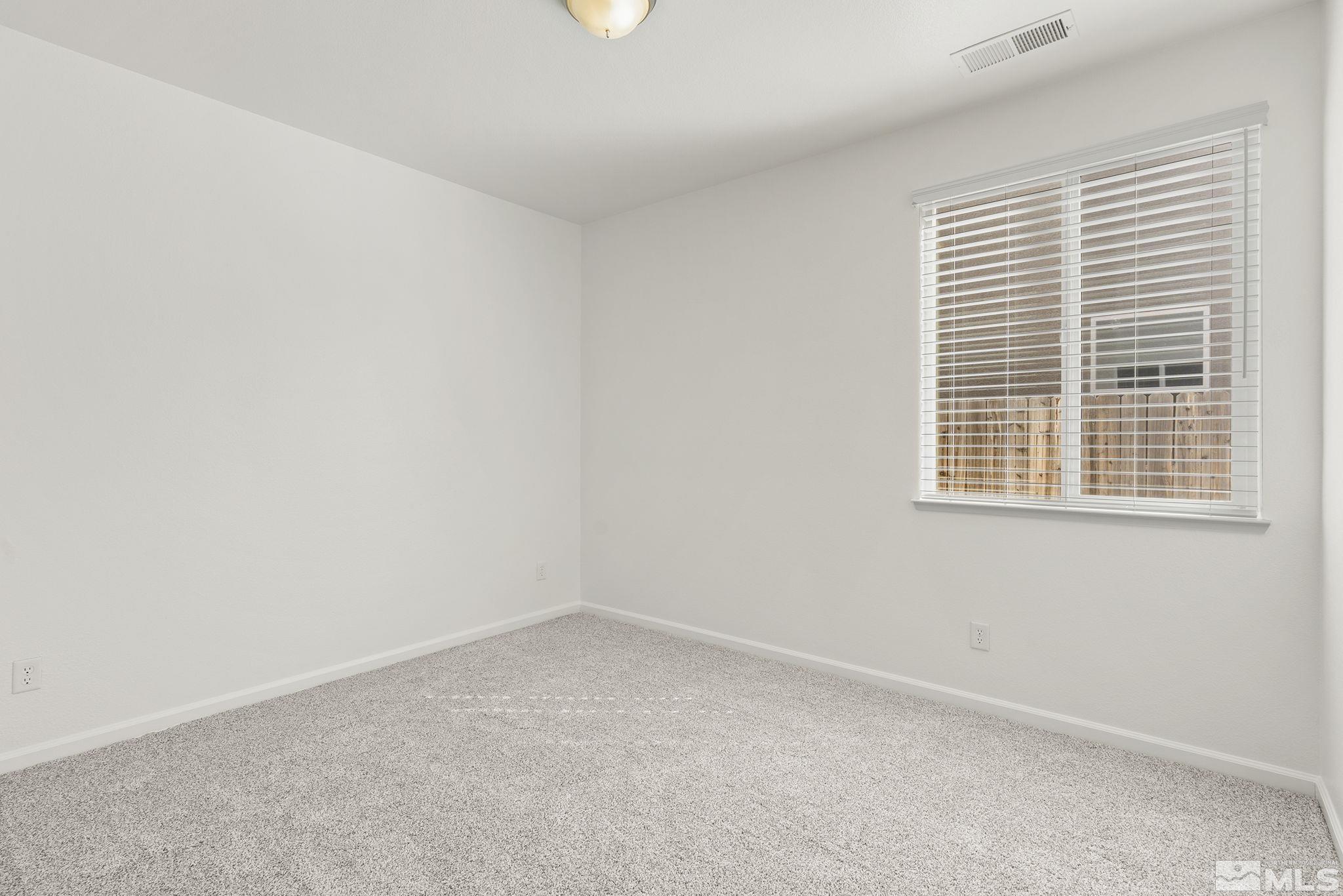 9130 Andraste Way Reno, NV 89506 - Photo 16 of 19 an empty room with a window