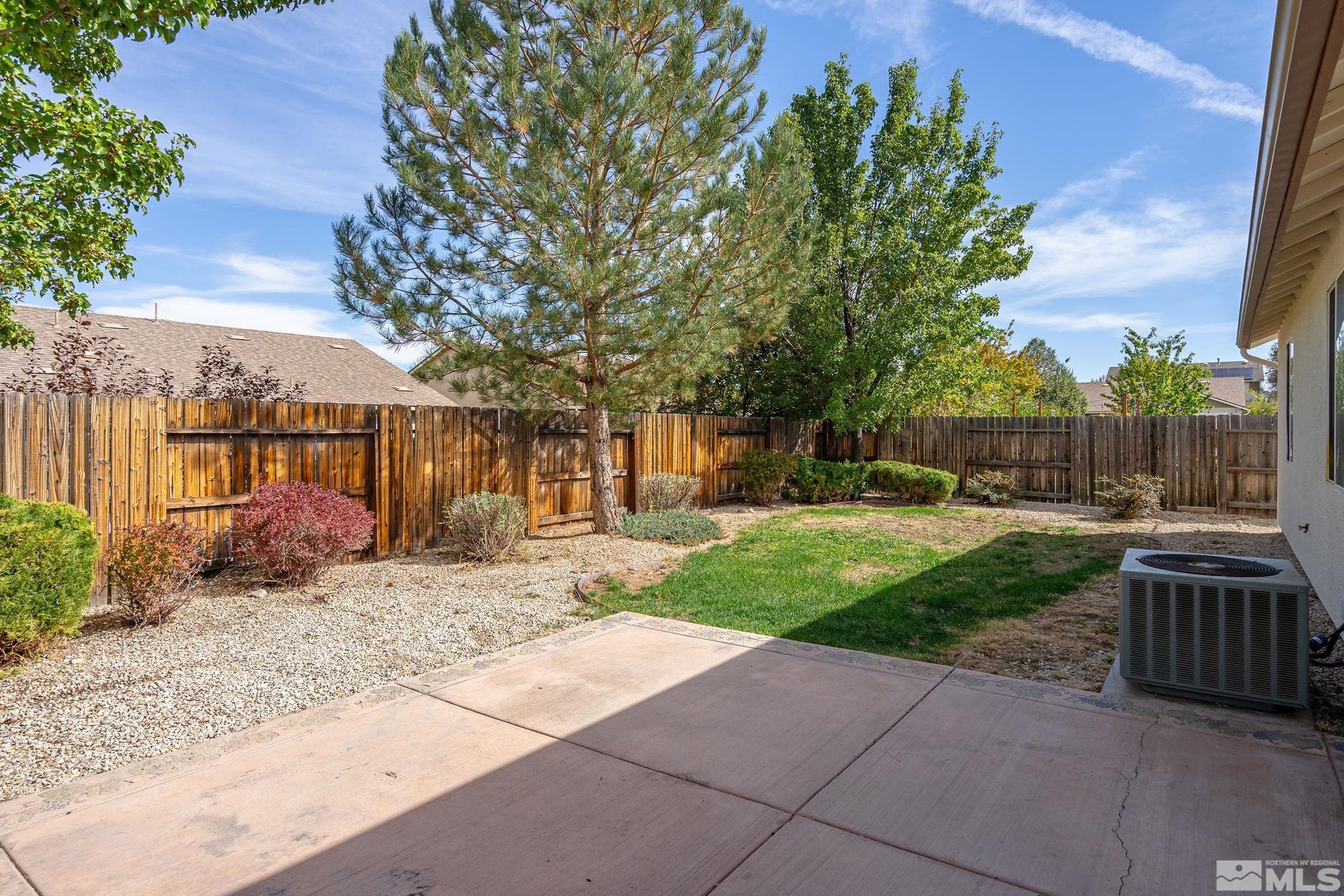 9130 Andraste Way Reno, NV 89506 - Photo 18 of 19 a view of a backyard with sitting area