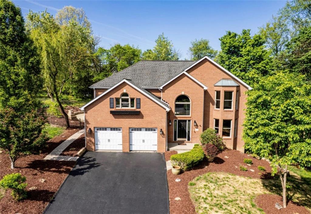 1120 Sandstone Road Greensburg, PA 15601 - Photo 1 of 43 a view of a house with a yard